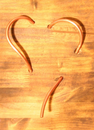 1/4" Copper Tubing in 3/4" Pine Board Image